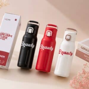 Insulated stainless steel sports water bottle 680ml with push-lock lid set in black, red and white.